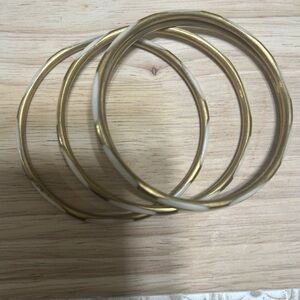 Elegant Gold and White Bangles